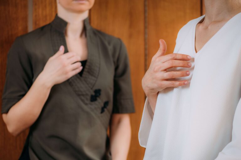 EFT in trauma recovery, two women practising EFT tapping.