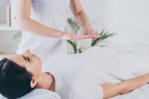 therapist performing healing exercise
