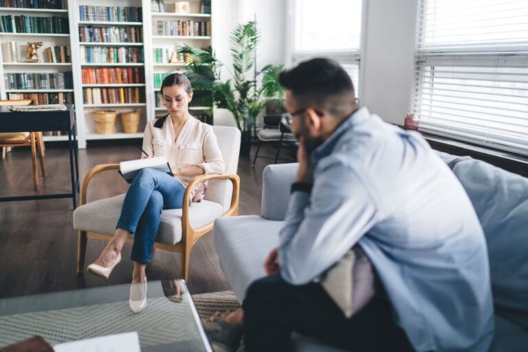 a therapist discussing the benefits of therapy for stress relief