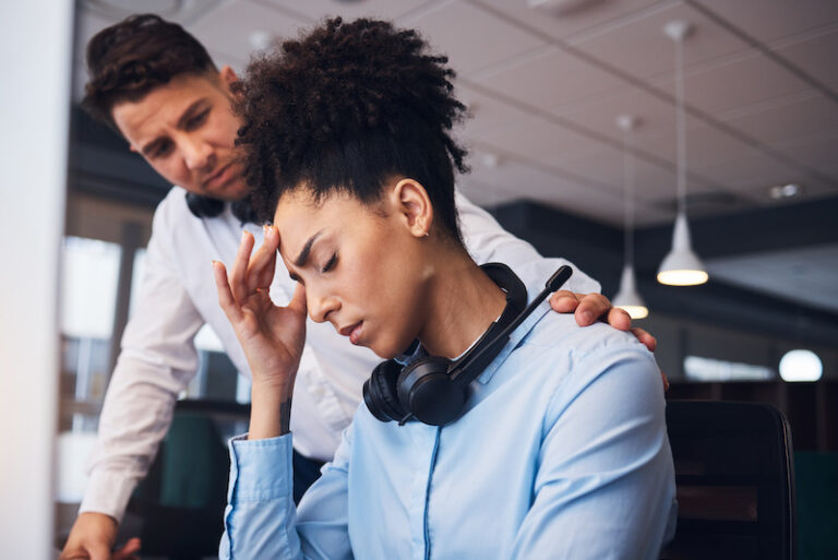 Work-life balance, woman stressed at work.