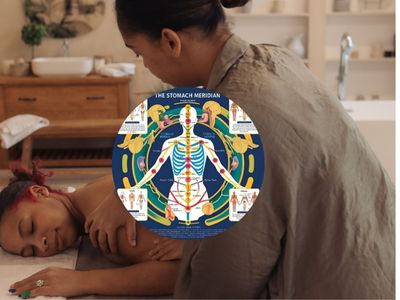 A holistic therapy session where a therapist gently works on a client’s neck and shoulders, symbolizing the connection between digestion, stress, and muscle tension. The setting includes soft lighting, healing crystals, and an energy meridian overlay representing the Stomach Meridian pathway.
