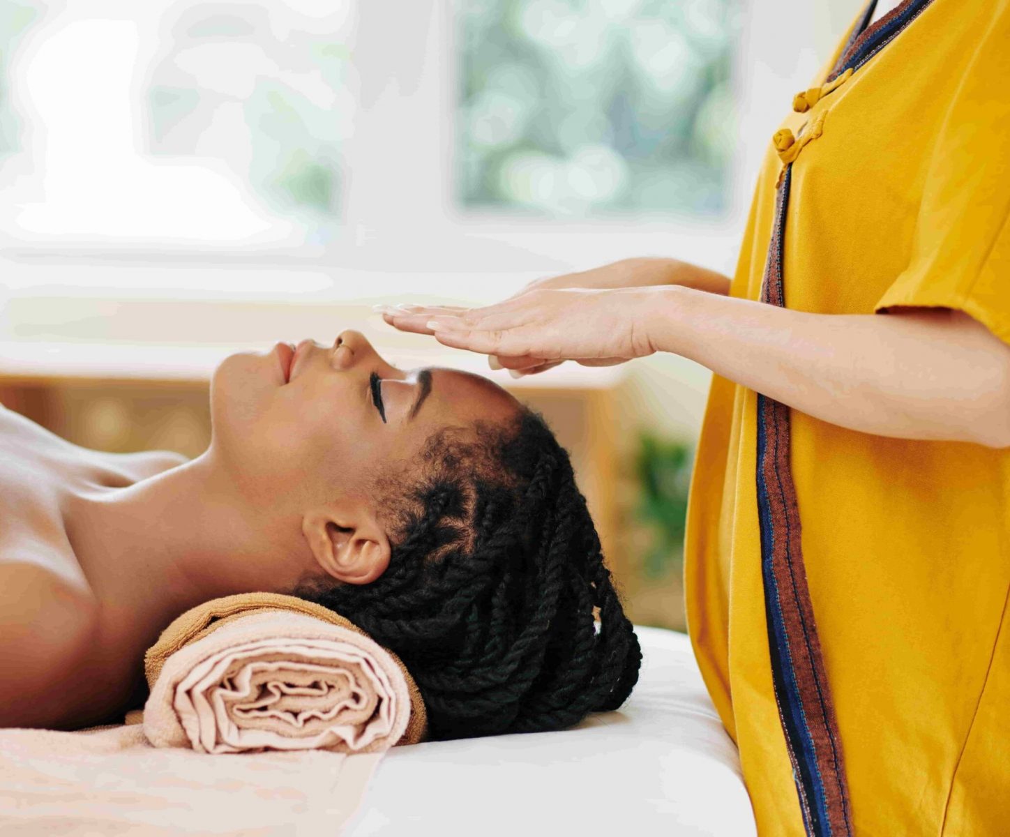 A woman performing Reiki Eastbourne​