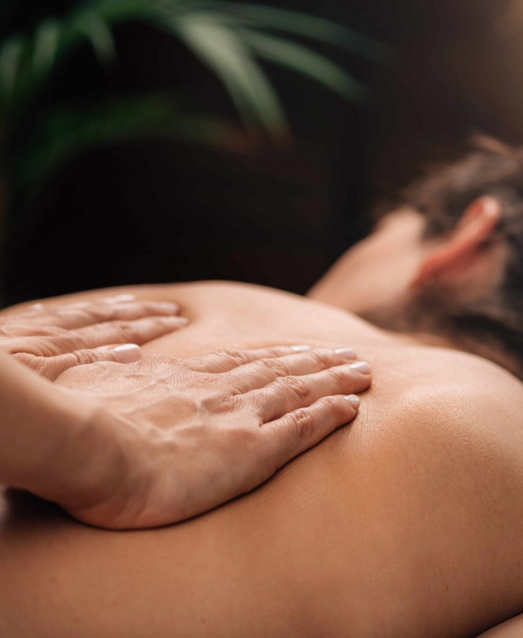 Deep integrated massage, person giving massage to another person.